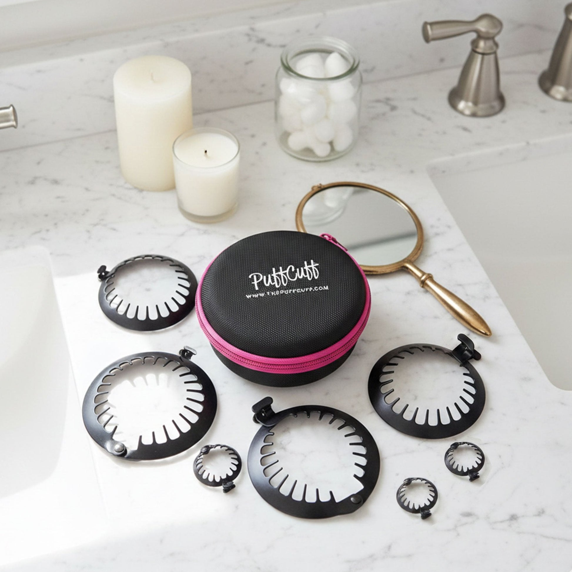 PuffCutt product set on a marble countertop with candles and a mirror.
